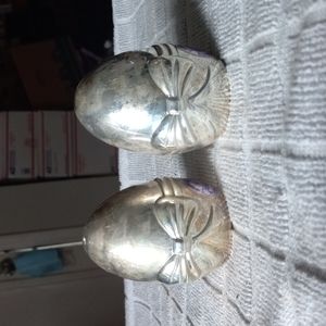 ISC Silver plated egg with bow salt and pepper shakers.